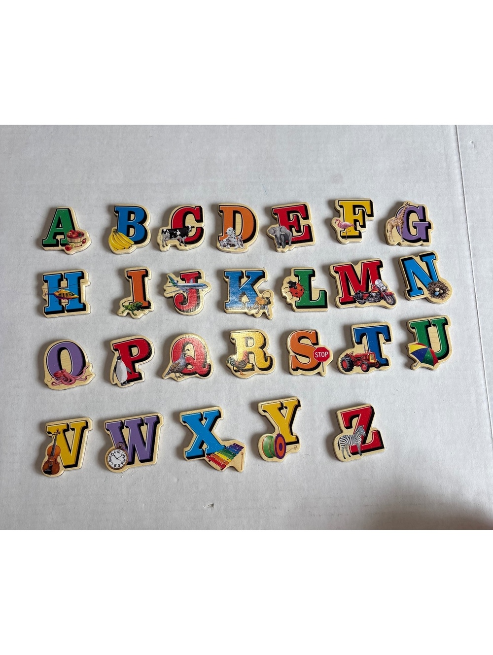 Wooden alphabet magnetic pieces